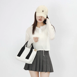 Japanese style large capacity canvas tote bag paired with stylish casual outfit