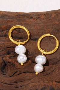 Detail of 18k gold plated hoop earrings featuring double irregular white pearls