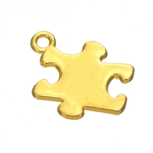 Polished gold alloy puzzle piece charm with integrated loop for DIY jewelry projects