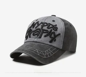 Detail of vintage washed baseball cap with NYPD'S Graphy 3D embroidery and contrast stitching