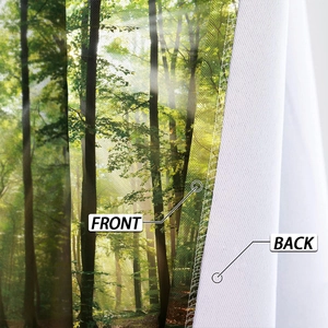 Detailed view of forest print curtain showing front pattern and white back fabric