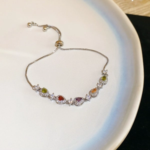 Close-up of teardrop zircon bracelet with colorful stones and adjustable slide clasp