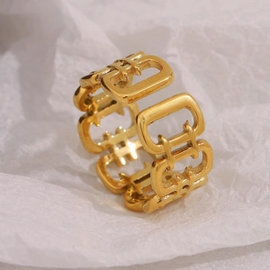 Macro shot of 18K gold plated stainless steel open ring with hollow chain link design
