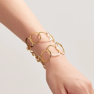 Elegant gold interconnected oval link bracelet for women with minimalist metal texture