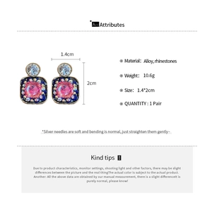 Detail view of vintage rhinestone square earrings with material and size specifications