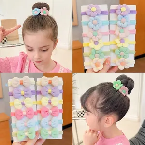 Kids elastic hair bands set with flower and bow designs in pastel macaron colors