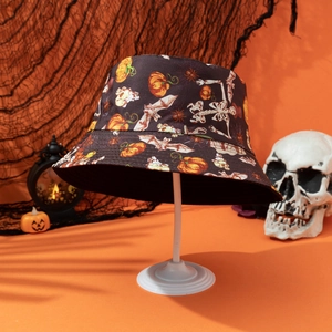 Halloween bucket hat with pumpkin, skull, and bat patterns on orange background