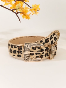 Detail of leopard print belt with vintage engraved gold buckle and metallic beaded edges