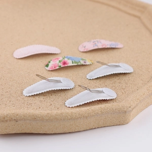 Set of 6 sweet floral embroidery fabric snap hair clips for kids on a cork tray