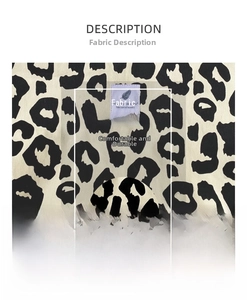 Detailed close-up of thick leopard print canvas fabric with durable twill texture