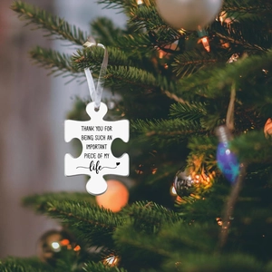 Acrylic puzzle car charm with 'Important Piece of My Life' text on Christmas tree