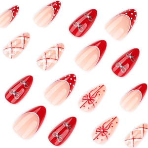 Red almond press-on nails with French tips, polka dots and bow designs for women