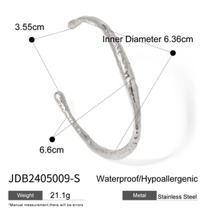 Irregular textured silver stainless steel cuff bracelet with dimensions and features