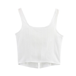 Detail showing white ribbed knit crop top with front lace-up design and slim fit cut