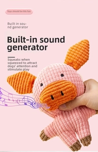 Detail of pink pig plush dog toy with built-in squeaker and corduroy texture