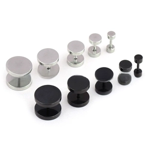 Detail view of silver and black stainless steel dumbbell stud earrings in various sizes