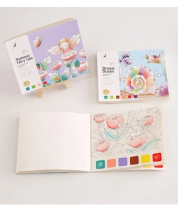 Detail of portable watercolor book with built-in paint palette and cartoon line drawings