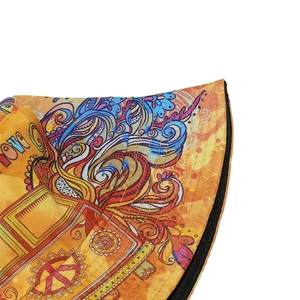 Detail of bohemian sun hat featuring colorful patterns with LOVE print and peace sign