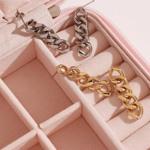 Elegant gold and silver stainless steel chain tassel earrings in a pink velvet jewelry box