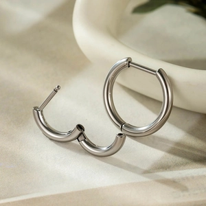 Polished silver G23 titanium hinged hoop earrings for ear piercing in a pair set
