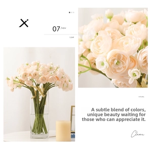 Detailed close-up of artificial camellia bouquet in a modern clear glass vase