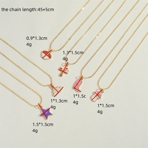 Collection of gold 14K star and mushroom enamel necklaces with 45+5cm chain details