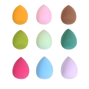Set of 9 multi-colored teardrop makeup sponges for wet and dry cosmetic application