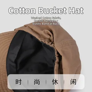 Close-up of washed cotton baseball cap featuring elastic back strap and sweatband detail