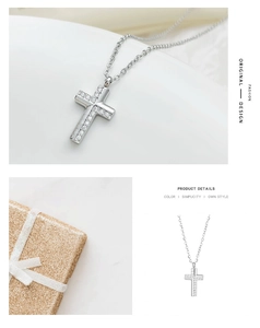 Macro view of cross pendant featuring cubic zirconia inlay and silver-tone finish