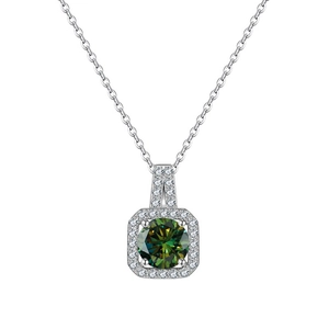 Macro shot of 925 sterling silver necklace featuring a square green gemstone pendant