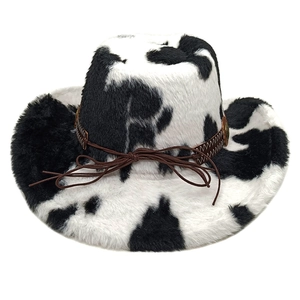 Detail of cow print cowboy hat with plush texture and brown faux leather braided band
