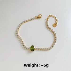 Detail of tennis bracelet with green emerald zircon and adjustable lobster clasp, weight 6g