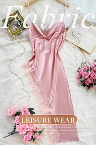 Detail of pink satin sleepwear with delicate eyelash lace trim on a romantic floral background