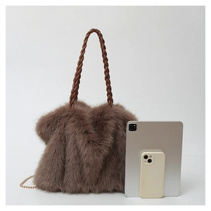 Size comparison of a brown plush tote bag next to a tablet and a smartphone