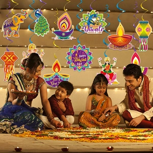 Vibrant Diwali hanging swirl decorations with peacock, elephant, and diya motifs for festivals