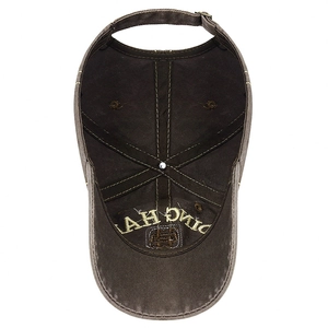 Inside view of vintage brown baseball cap featuring yellow stitching and embroidery