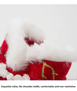 Detail of red festive pet outfit featuring white faux fur collar and pearl decorations