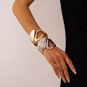 Polished gold and silver asymmetric hollow cuff bracelets in minimalist geometric style