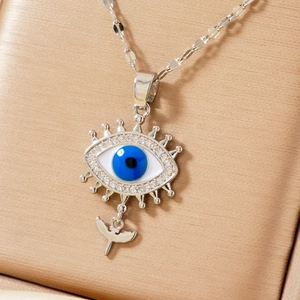 Luxurious hip-hop evil eye necklace with blue zircon and bird pendant on satin