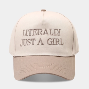 Detail of embroidered Literally Just A Girl text on a contrast cotton baseball cap