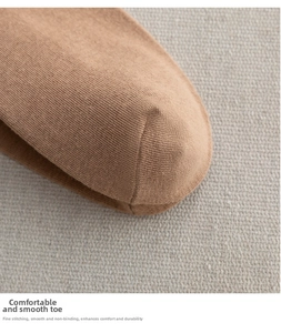 Macro shot of flat stitched toe on coffee brown knit socks with durable texture