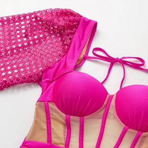 Maillot de bain corset fuchsia en résille avec manches en dentelle et baleines