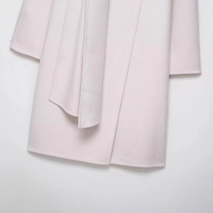 Pale pink wool blend long coat for women featuring premium minimalist textured fabric