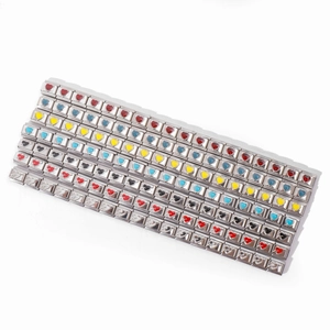 Detail view of various 9mm Italian charm links featuring colorful enamel heart patterns