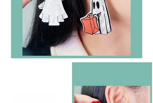 Close-up of a model wearing cartoon ghost acrylic earrings for Halloween party style