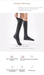 Deep grey over-knee yoga socks with non-slip silicone grip and five-toe separation design