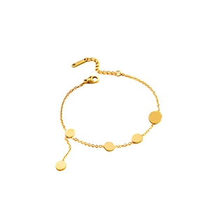 Minimalist gold link bracelet featuring geometric round discs and a secure lobster clasp