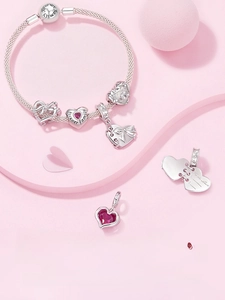 Detail of S925 silver snake chain bracelet with heart charms from Thanksgiving series