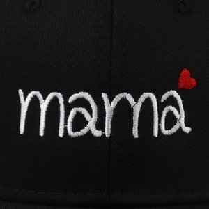Black cotton baseball cap with white mama embroidery and small red heart detail