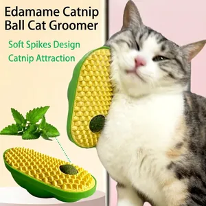Cat self-groomer and massager with soft bristles and rotatable catnip ball in green